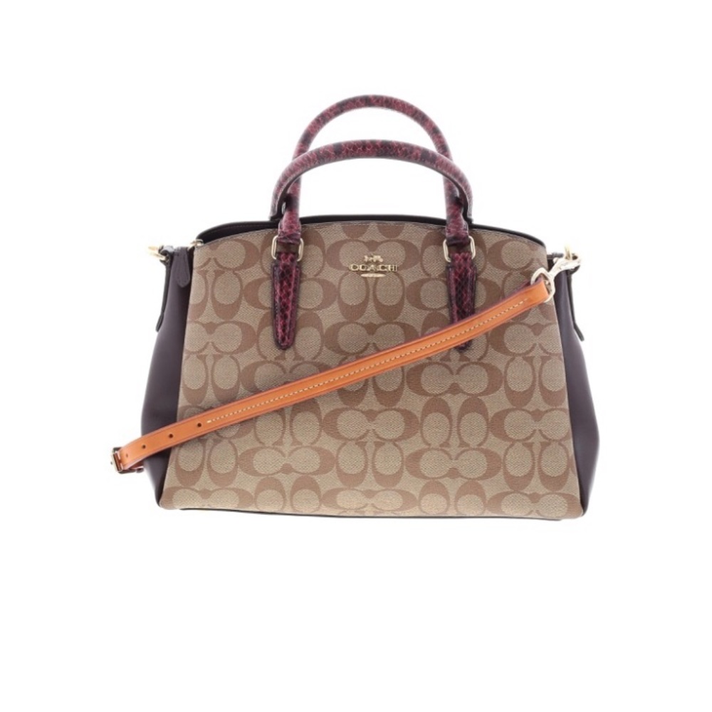 Like NEW exotic coach Purse